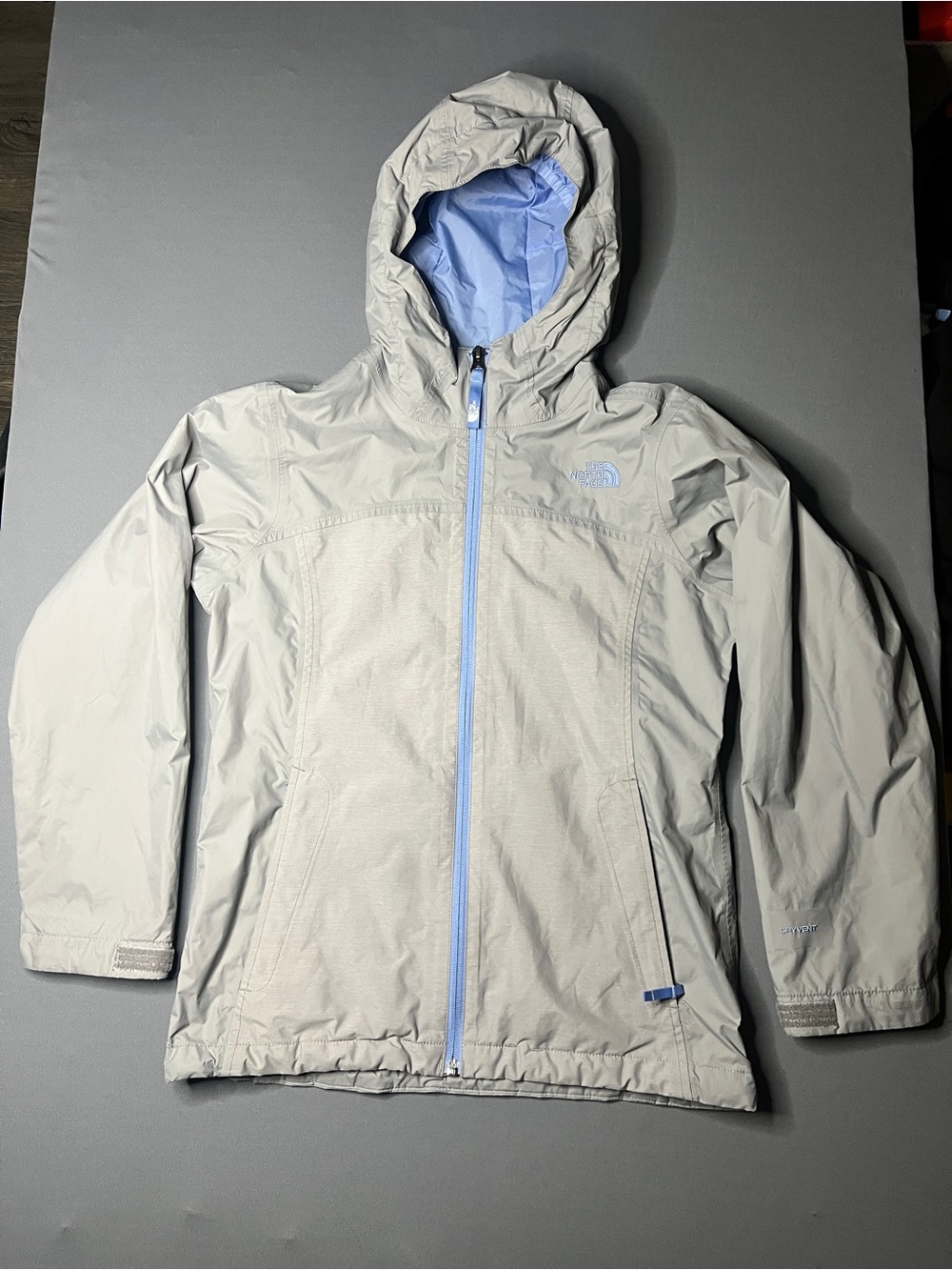 The North Face Light Gray Hooded Raincoat with Blue Lining